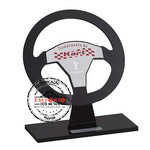 Trofu de campeonato - Trofu para campeonato de kart em acrlico com formato recortado de volante e gravao digital U.V., sobreposto em base de acrlico preto com plaquinha de ao inox gravada.